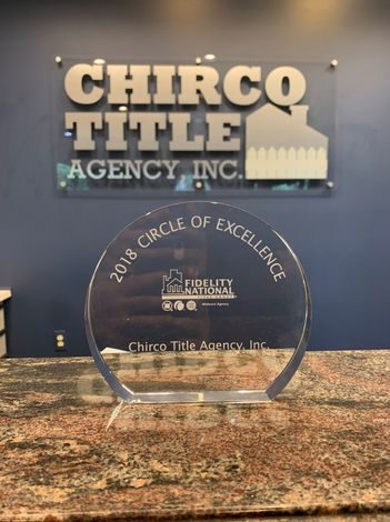 Chirco Title Agency office sign with the 2018 Fidelity National Circle of Excellence award